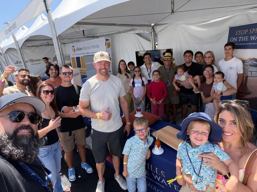 A group gathered at the Steadi Labs boat-show booth